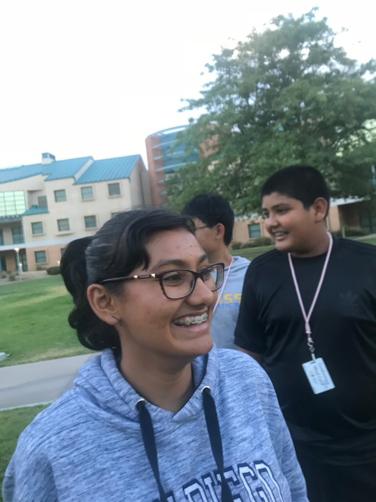 Summer Culinary students smiling on campus grounds