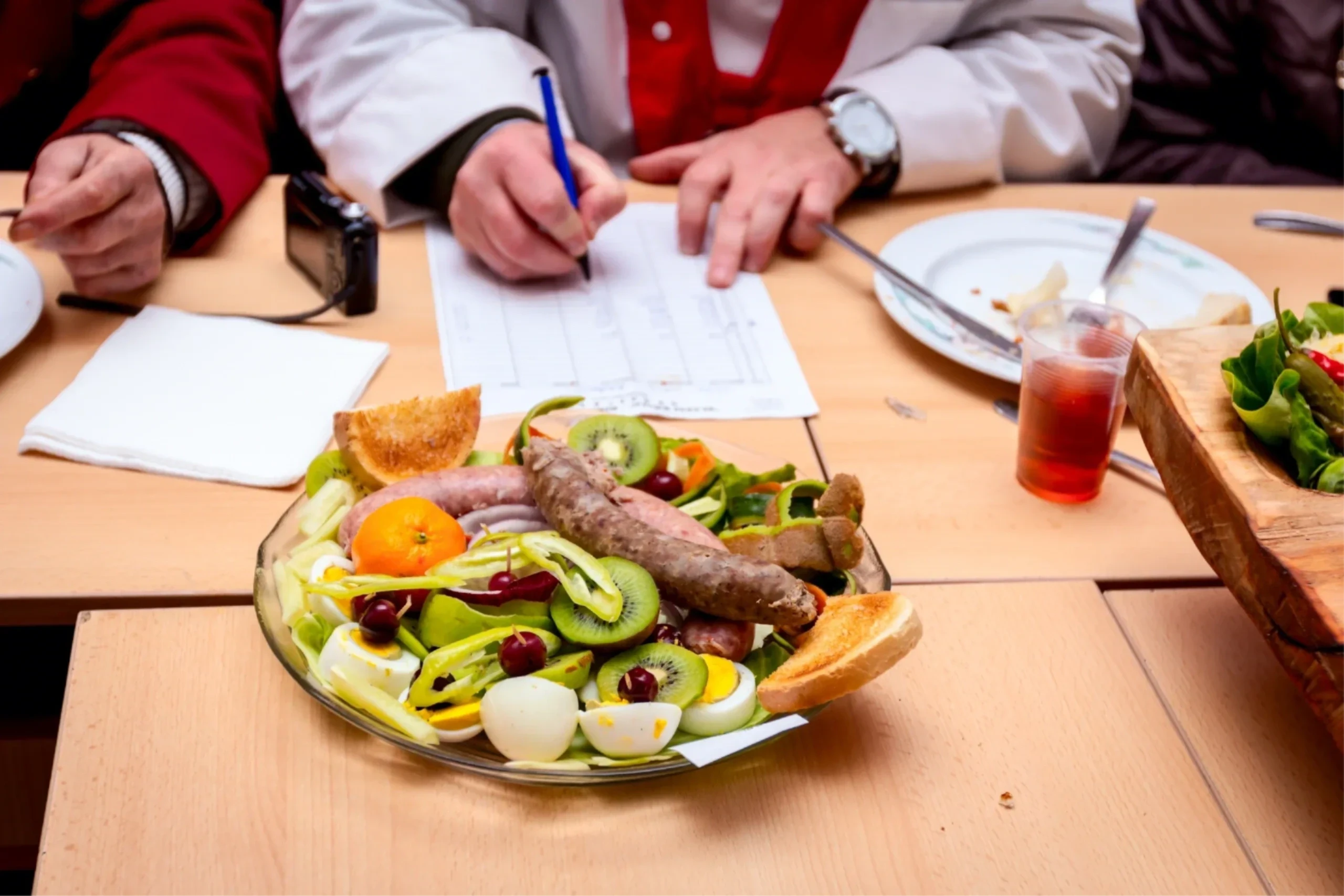 Chef instructor reviewing notes in the DC kitchen