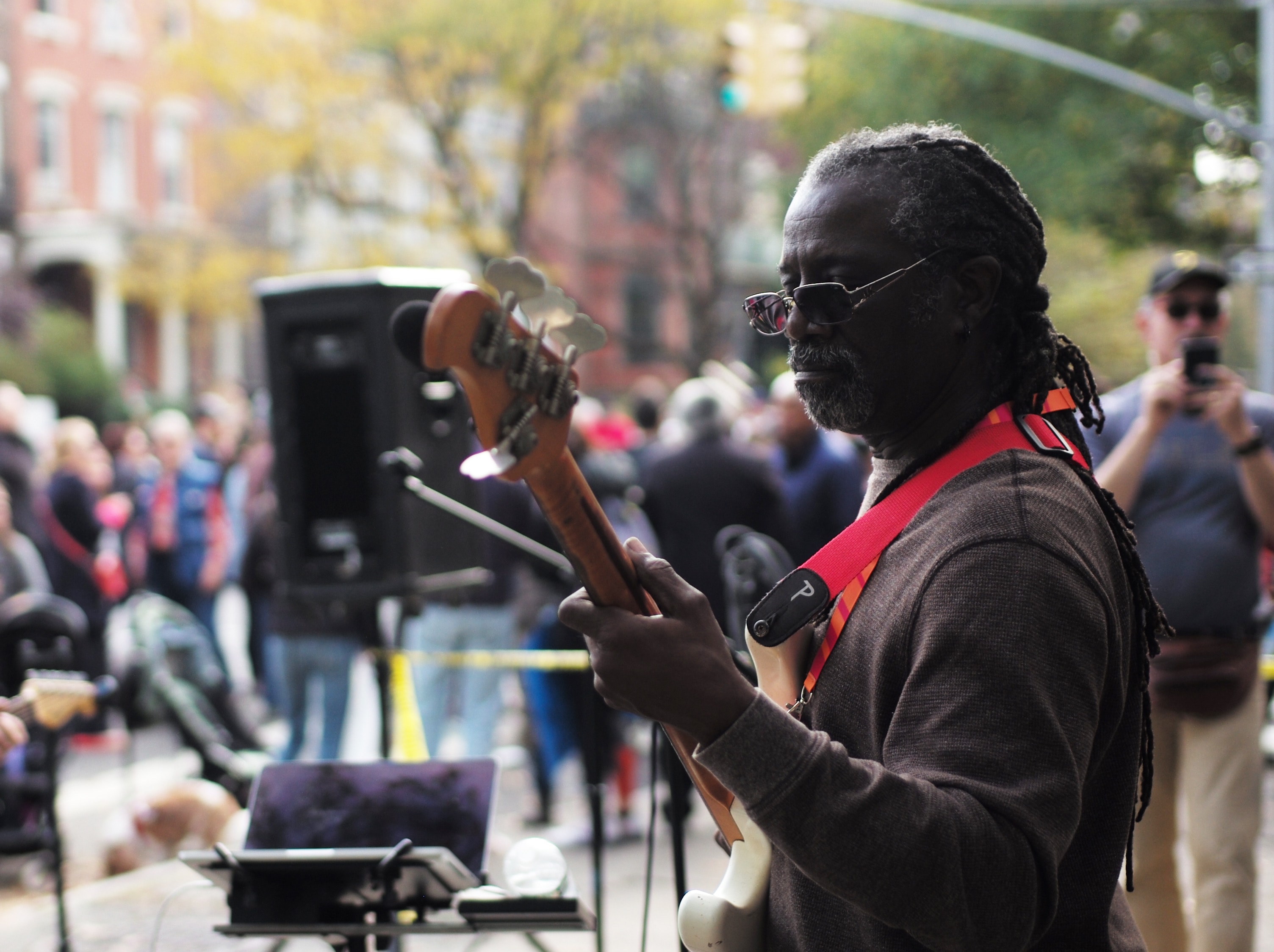 Musician performing at an outdoor street festival