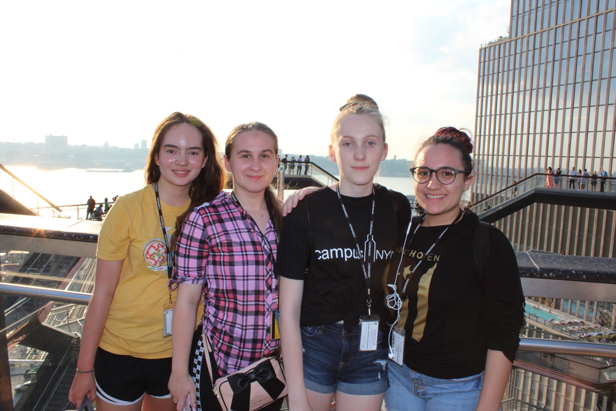 Campers on the Hudson Yards rooftop at sunset